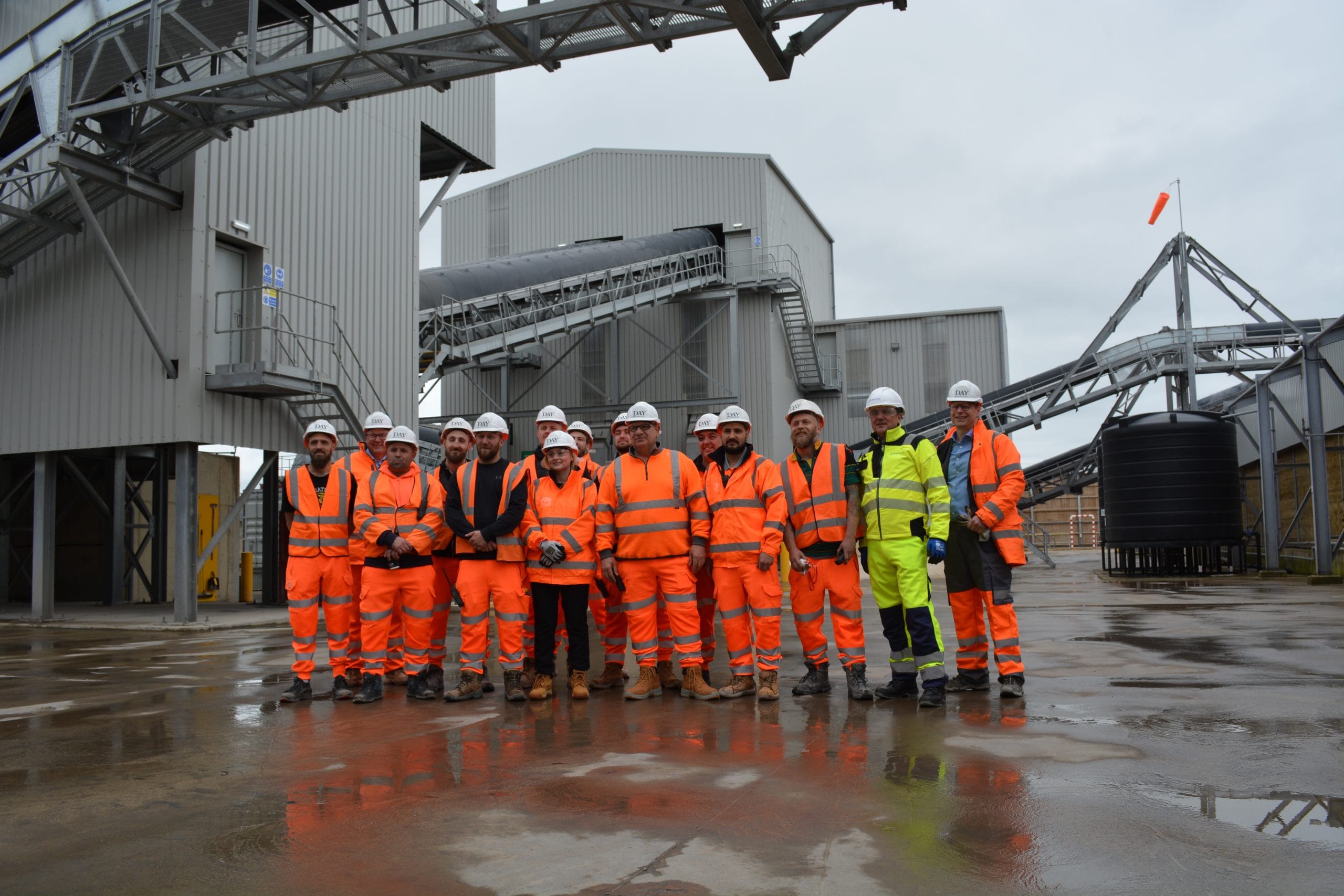 Group depot workers standing for a photo
