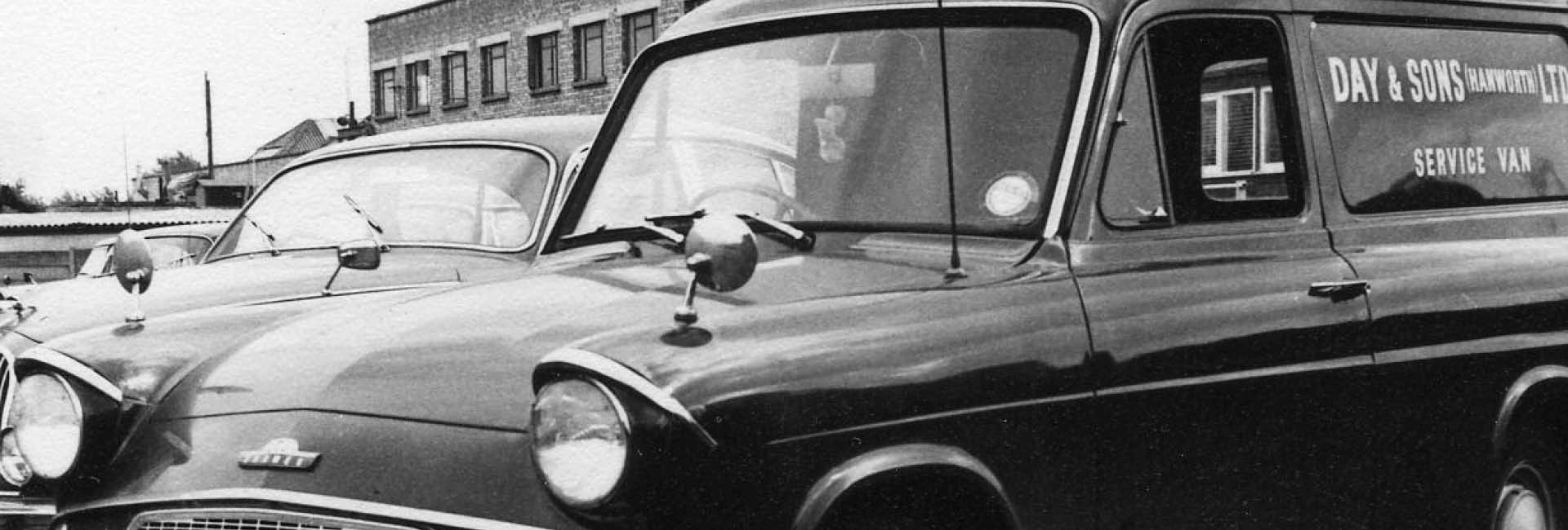 Black and white photo of day and sons branded car